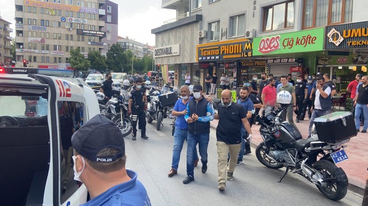 Havaya ateş eden şahıs polisi görünce kendini iş yerine kilitledi